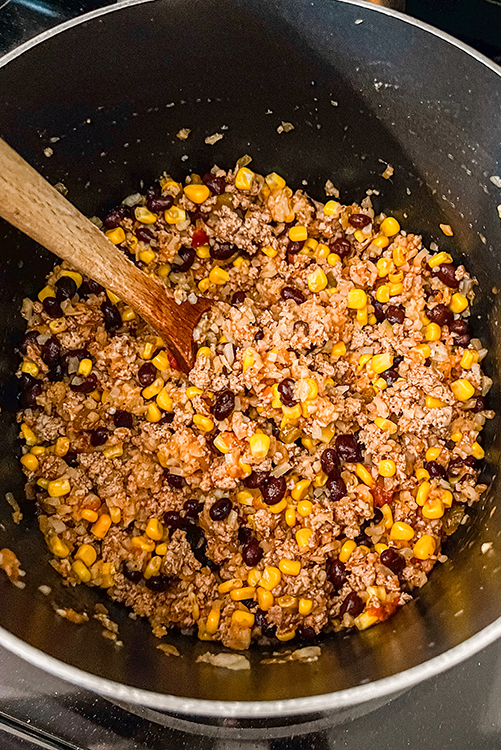 Mexican Cauliflower Rice Recipe Cooking with ground turkey, corn, and black beans