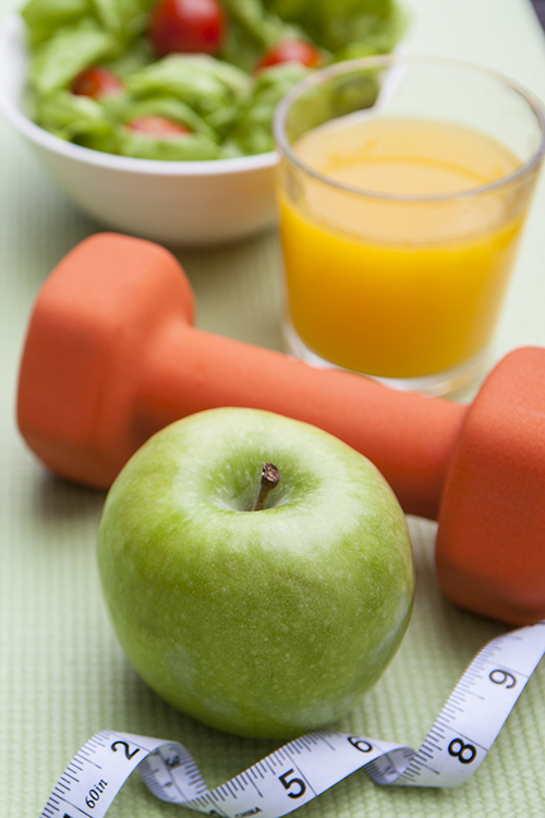 juice, apple, salad, and a hand weight