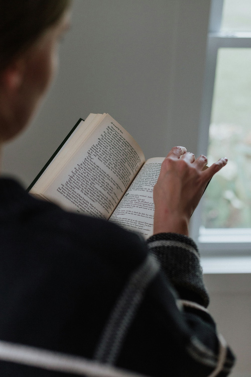 A woman reading a bible